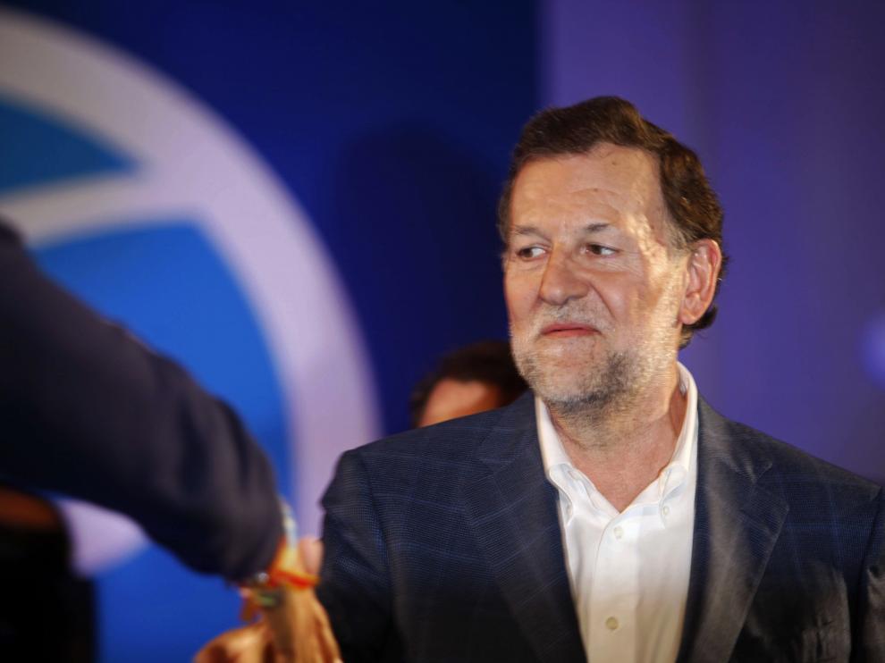 El presidente del Gobierno y candidato a la reelección por el PP, Mariano Rajoy, al inicio del mitin central de su partido hoy en A Coruña.