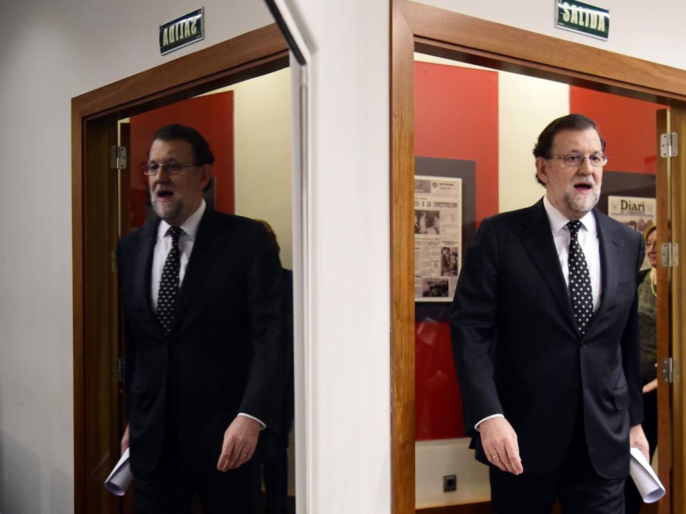 Rajoy, en la puerta de la sala de prensa de La Moncloa