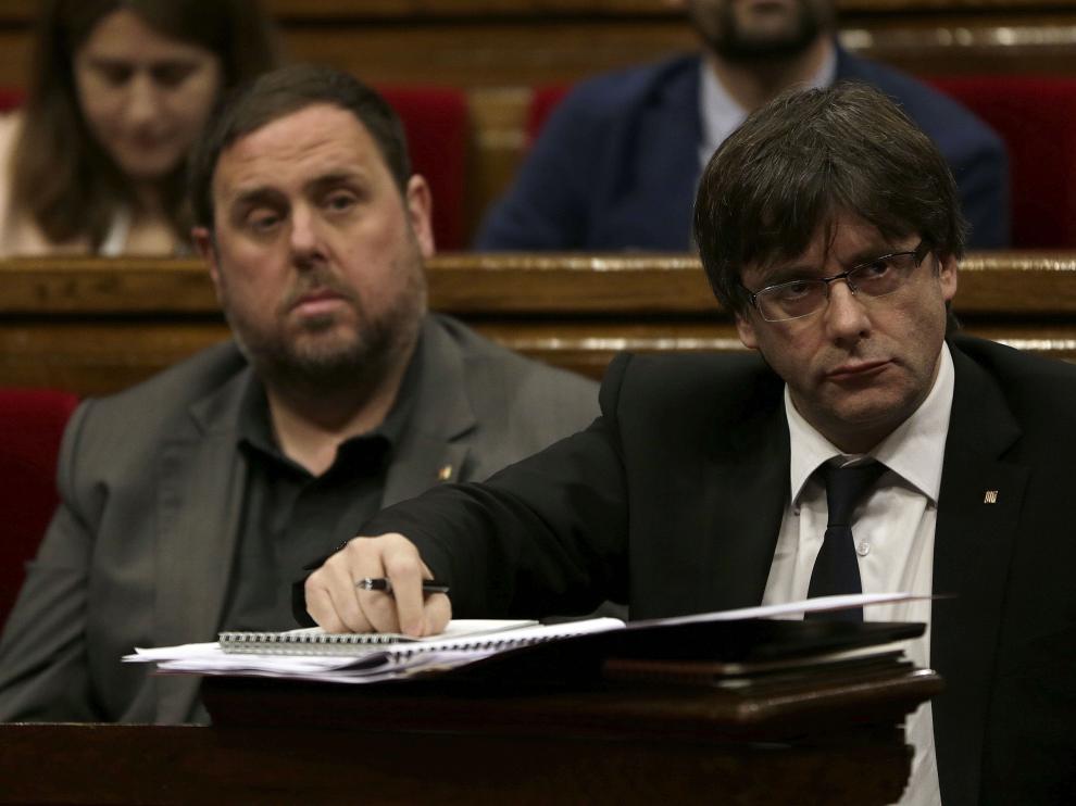 Carles Puigdemont junto a Oriol Junqueras.