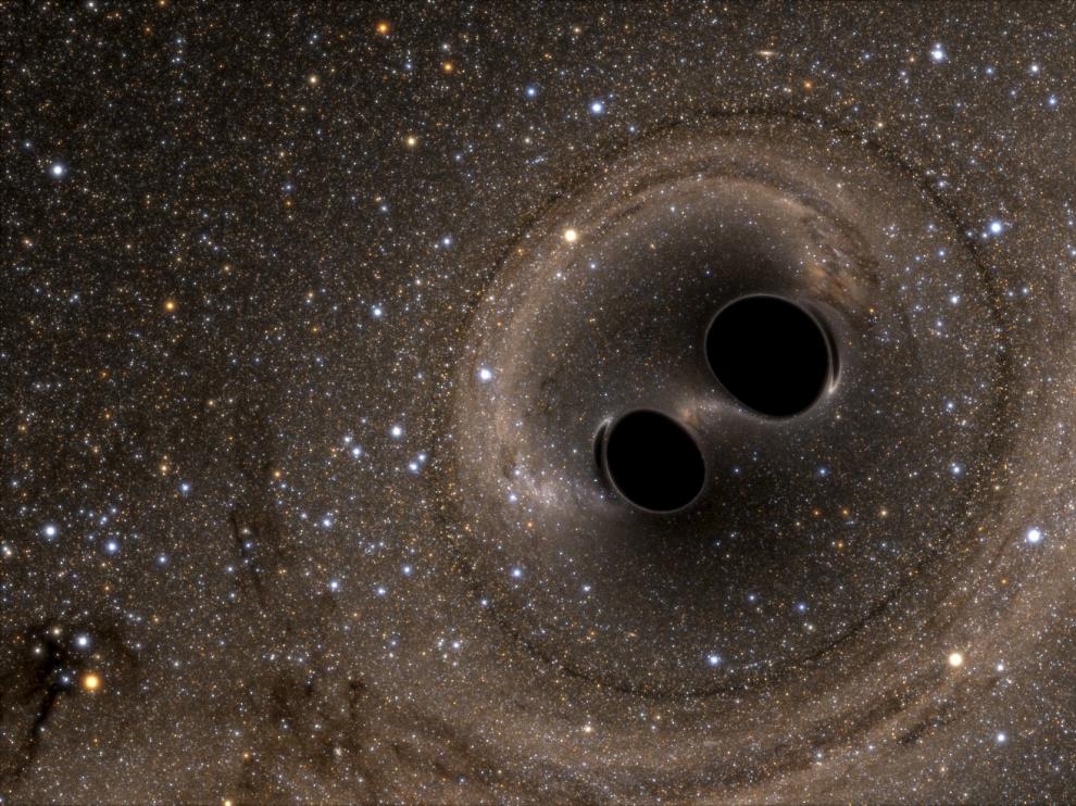 Simulación de la fusión de los dos agujeros negros de los que proceden las ondas gravitacionales detectadas desde el observatorio Ligo (Estados Unidos).