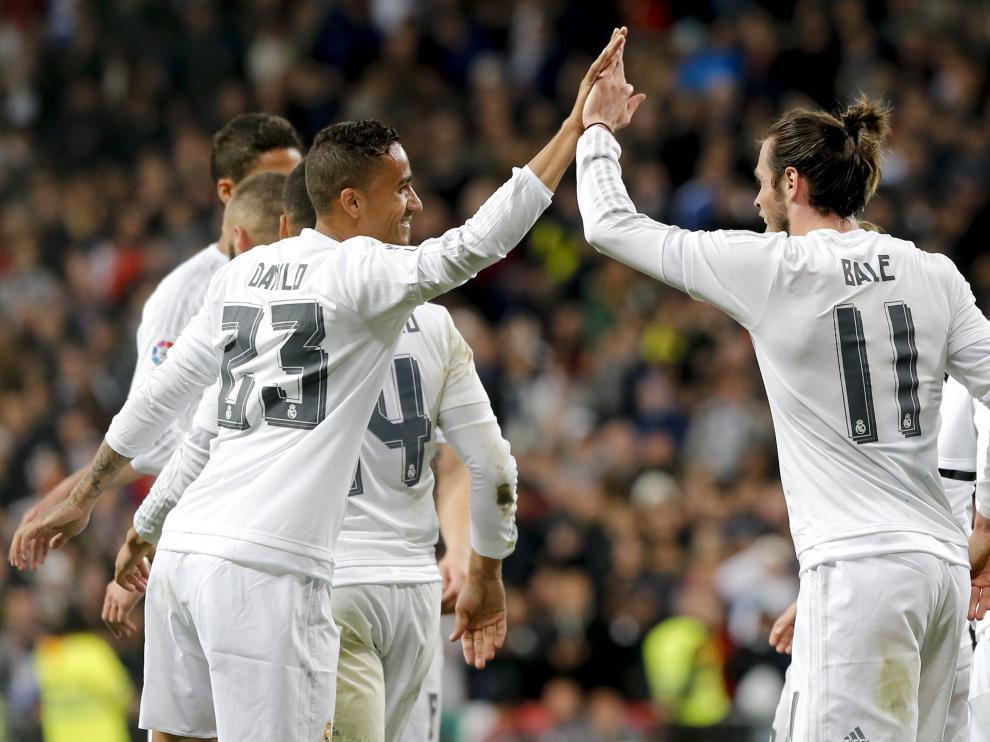Los jugadores del Real Madrid celebran el tercer gol ante el Sevilla.