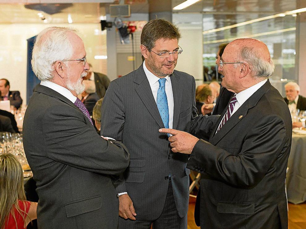 Forges y el ministro Catalá, ayer junto a Carlos Carnicer.