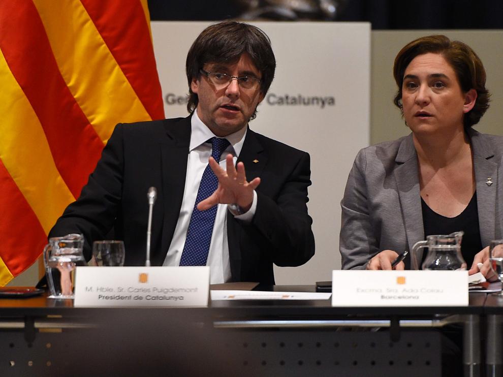 Carles Puigdemont y Ada Colau.