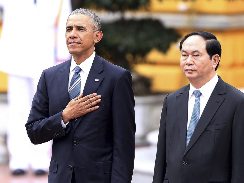 Barack Obama junto a su homólogo vietnamita, Tran Dai, en su visita a Vietnam.