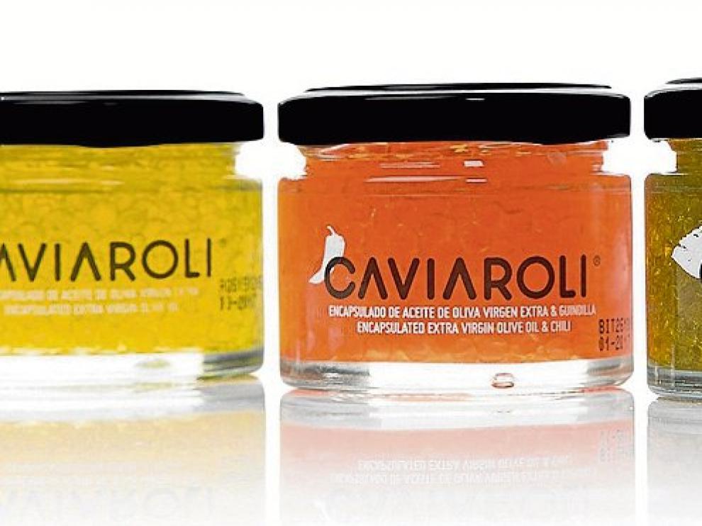 Los tarros en los que se comercializan las perlas de aceite de oliva.