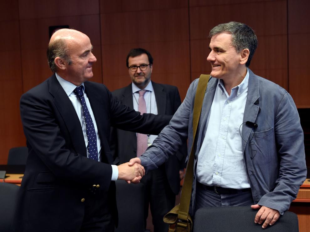 De Guindos junto al ministro de finanzas griego.