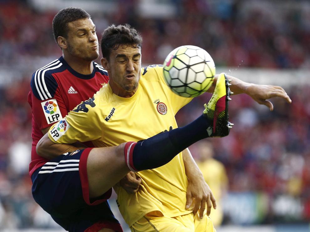 Bonnin y Jaime Mata durante una jugada del partido.