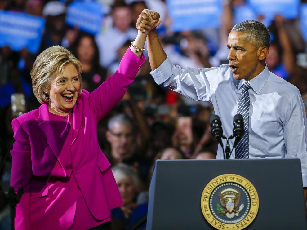 Obama, junto a Clinton este martes.