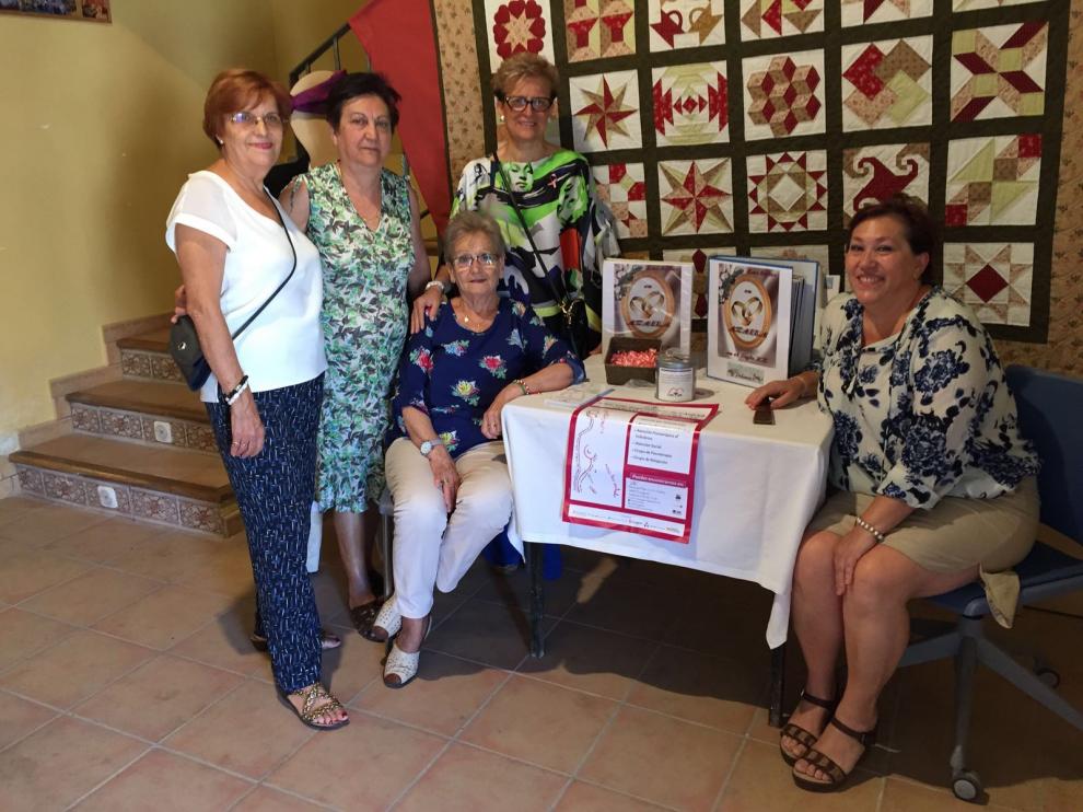 Parte de la Asociación de Amas de Casa, en la exposición.