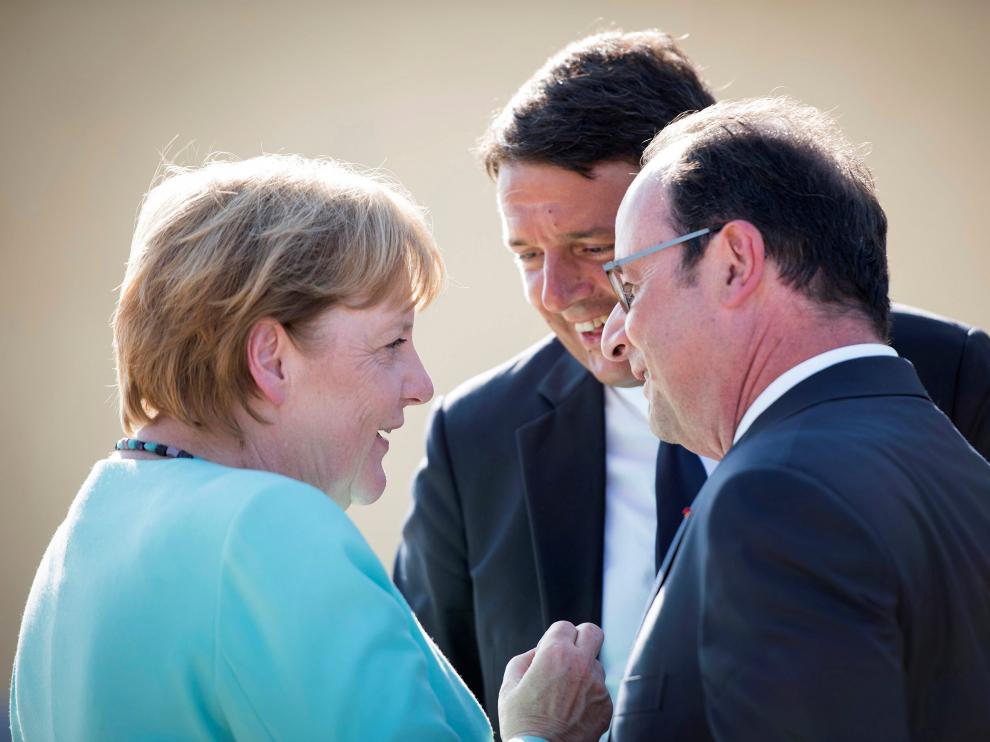 Los tres líderes reunidos en Italia.