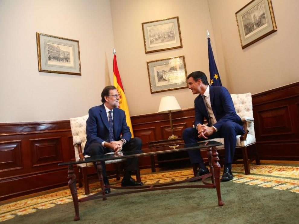 Rajoy ha recibido a Sánchez un día después de alcanzar el pacto con C's