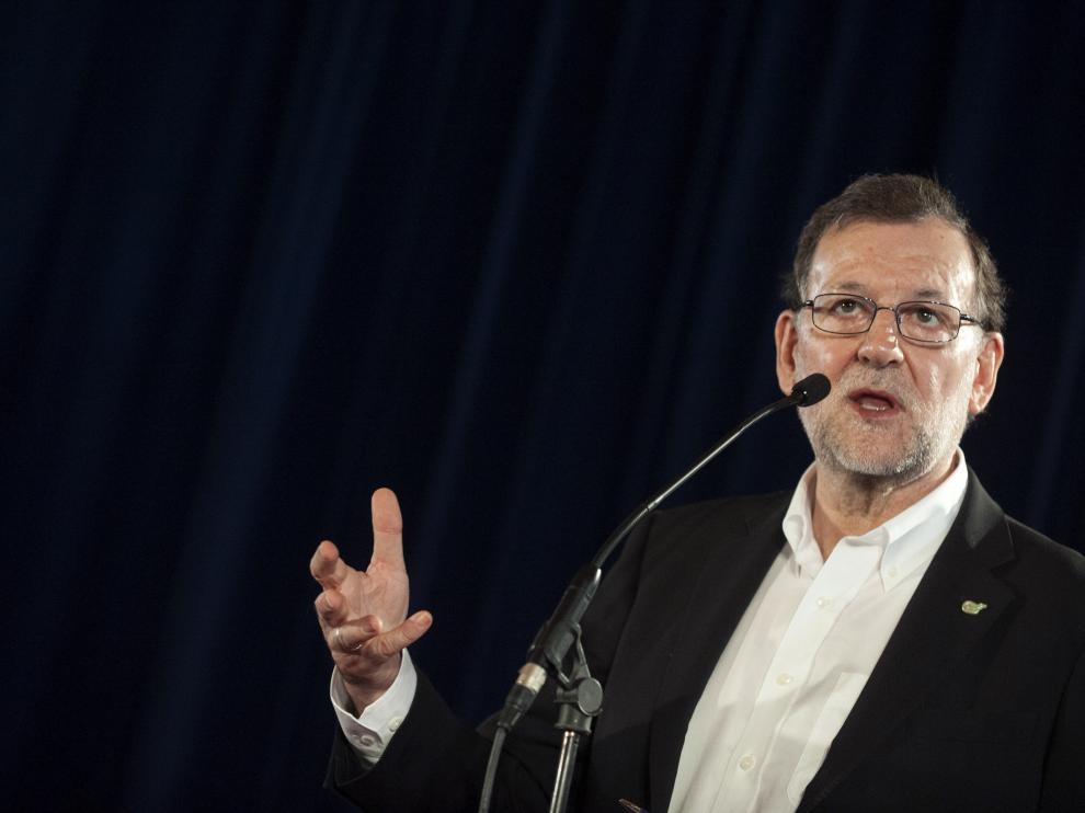 Rajoy durante su visita al Pozo de Mos enmarcada en la campaña electoral gallega