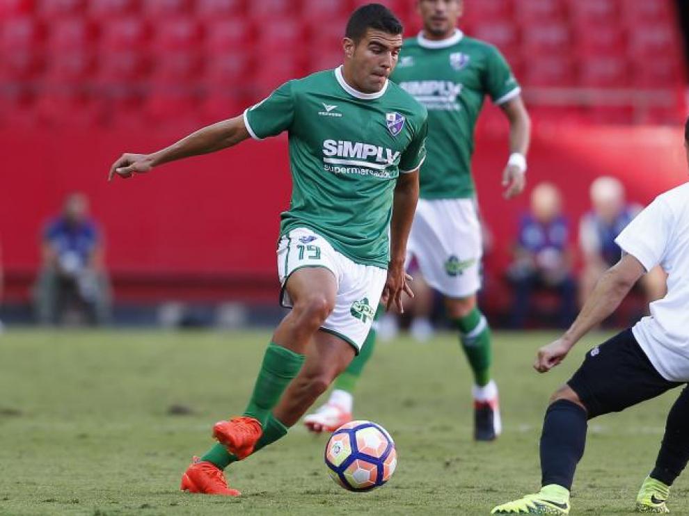 Un momento del envite del Huesca en el Sánchez Pizjuán