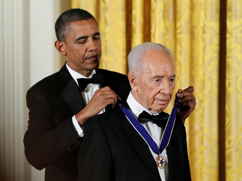 Barack Obama y Simon Peres en junio de 2012.