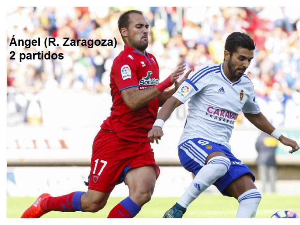 A la izda., Ángel durante el Numancia-Real Zaragoza del domingo. A la dcha., Carvajal, al término del Real Madrid-Villarreal del pasado miércoles 21, en el momento de protestar en tono elevado al árbitro González González en el Bernabéu.