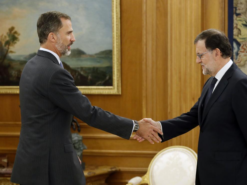 Felipe VI y Rajoy