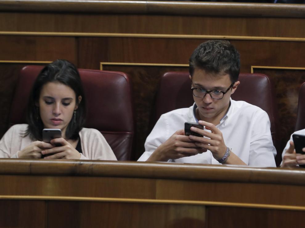 Irene Montero, Íñigo Errejón y Pablo Iglesias durante el debate de este jueves en el Congreso.