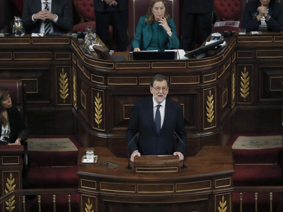 El líder del PP y presidente del Gobierno en funciones, Mariano Rajoy, durante su intervención en el debate de su investidura, esta tarde en la Cámara Baja.