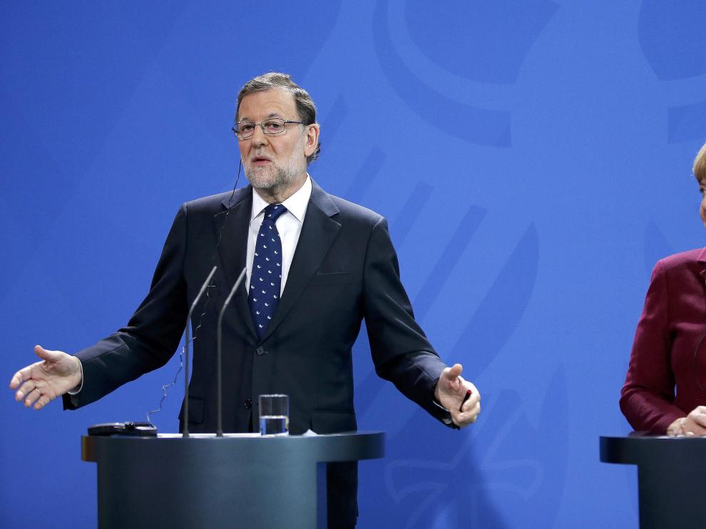 Mariano Rajoy y Angela Merkel en la cumbre de Berlín