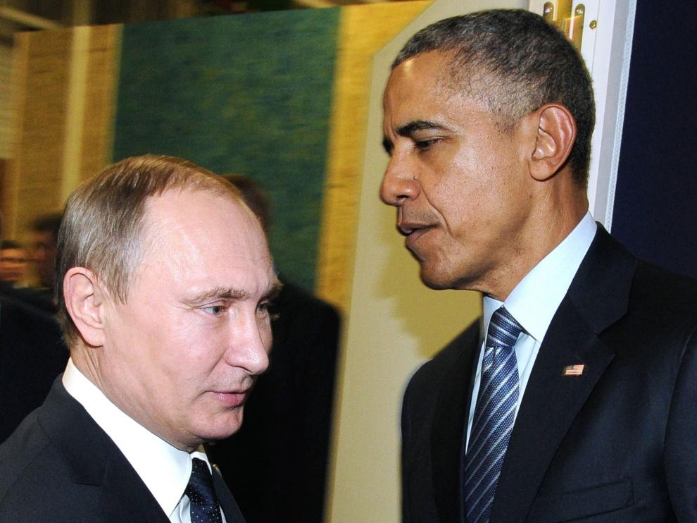Obama y Putin en un encuentro sobre el cambio climático.
