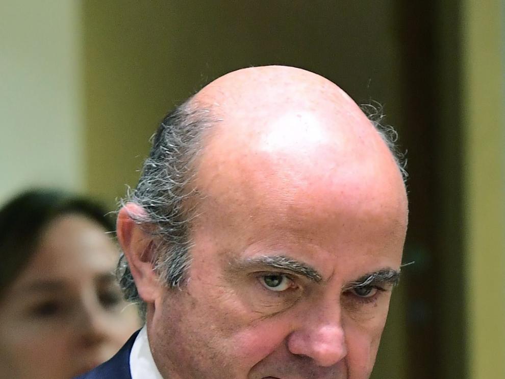 De Guindos.