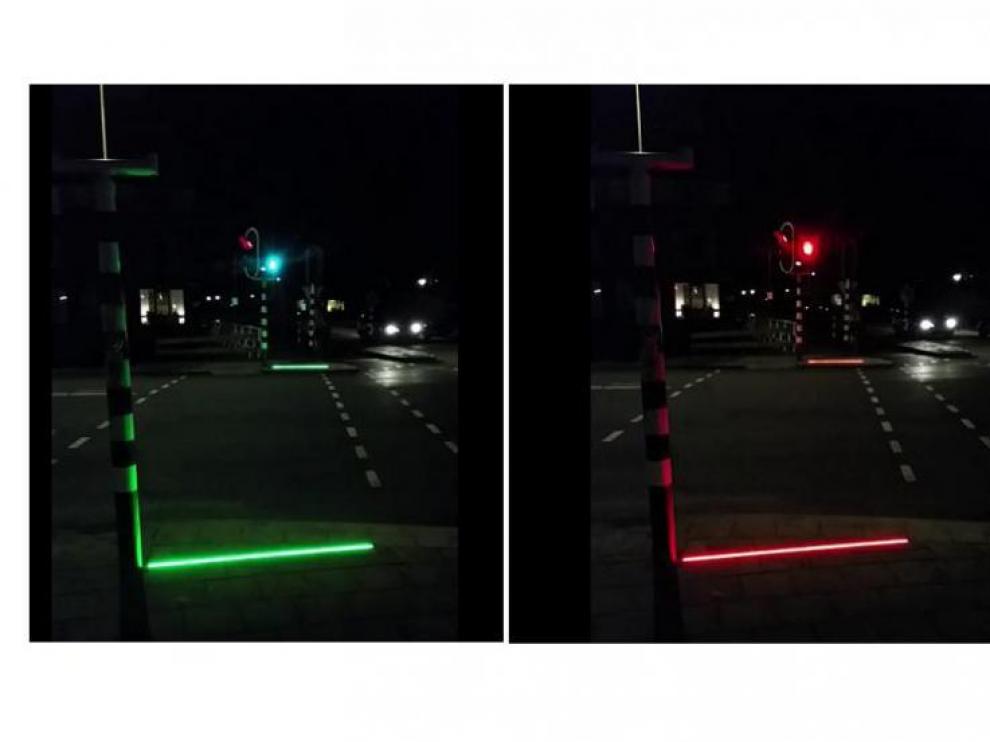 El sistema ilumina con una línea roja y verde el suelo.