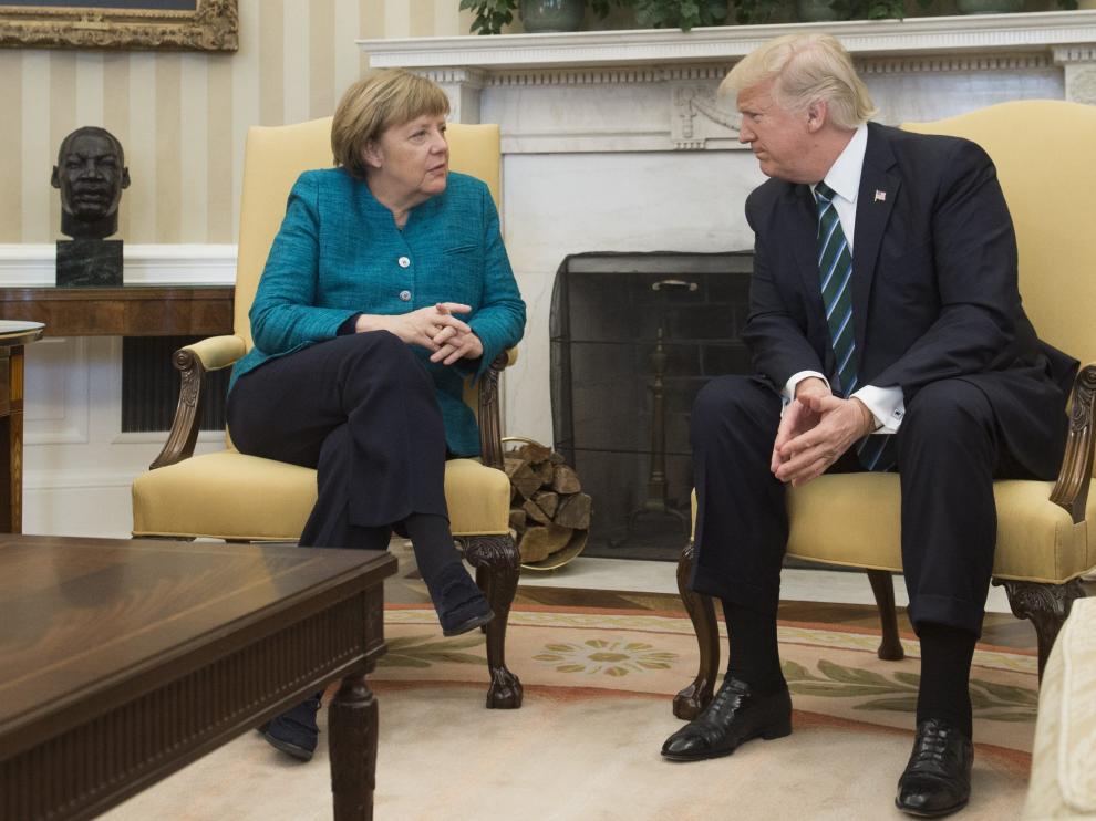 Trump y Merkel, este viernes en su reunión en la Casa Blanca.
