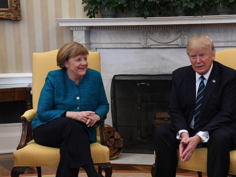 Trump y Merkel en la reunión de este viernes.