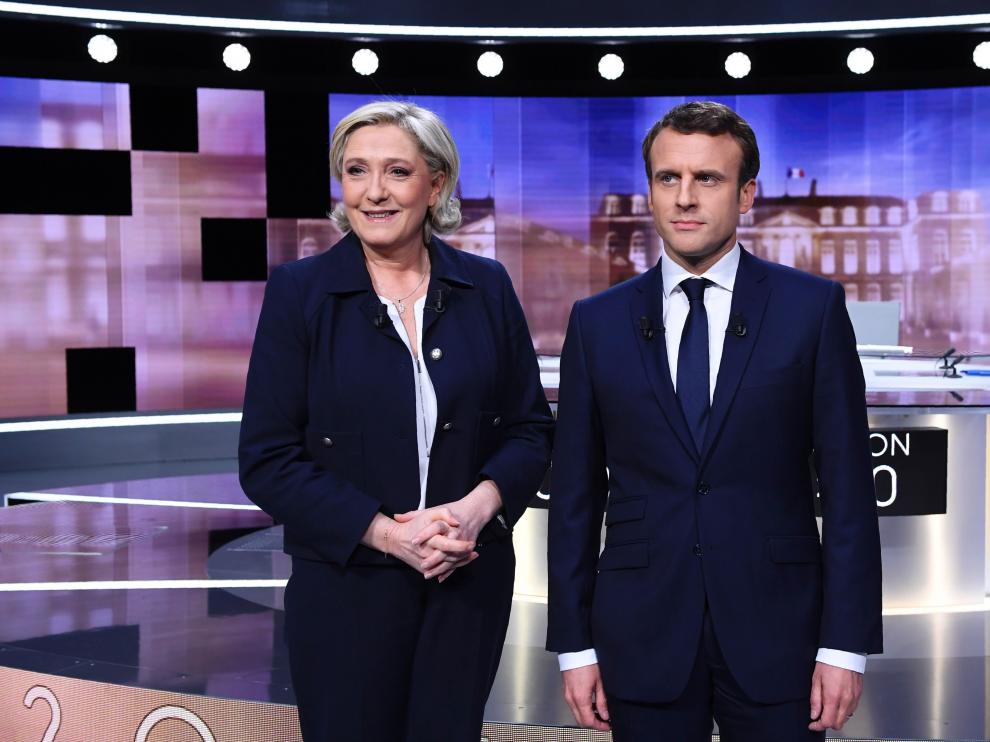 Le Pen y Macron, antes del debate de este miércoles.
