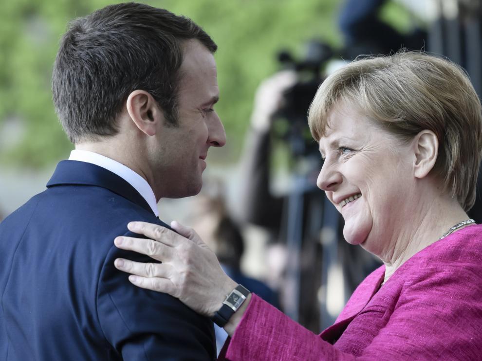 Macron y Merkel en una reunión.