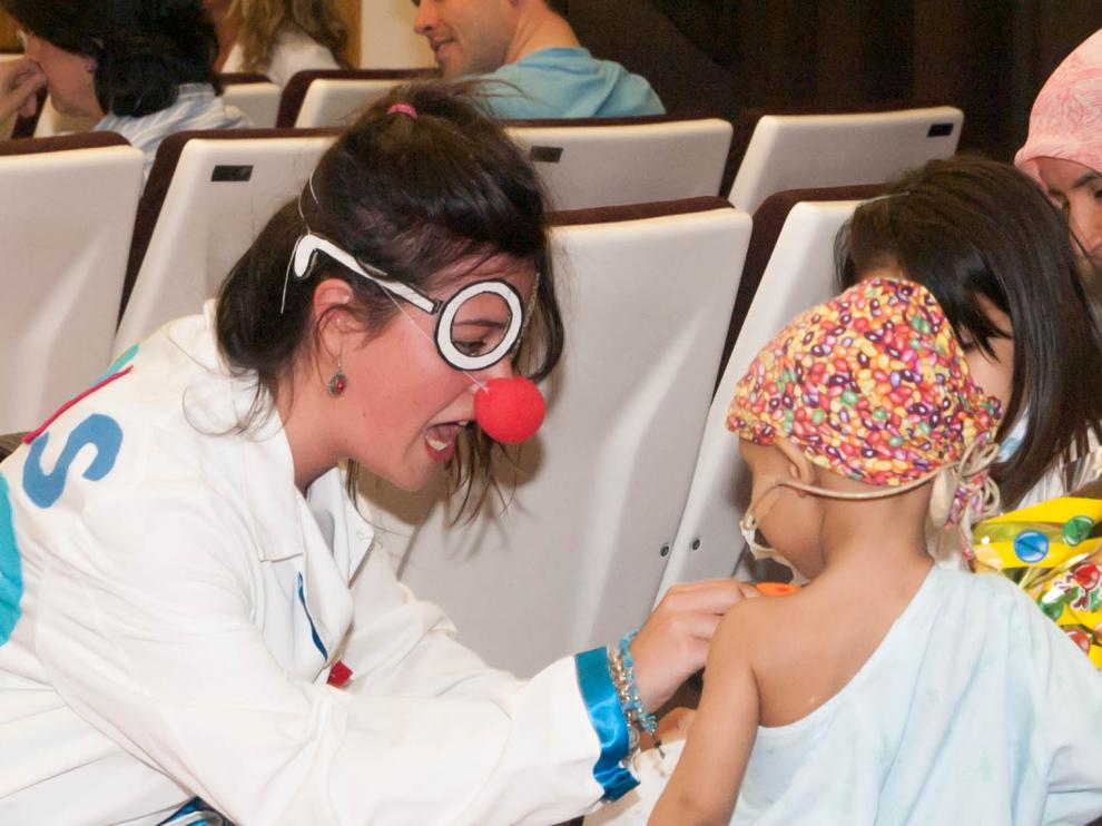 Imágenes del voluntariado con niños en el Hospital Infantil de Zaragoza.