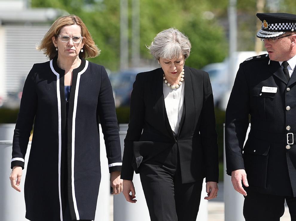 Amber Rudd, Theresa May e Ian Hopkins.