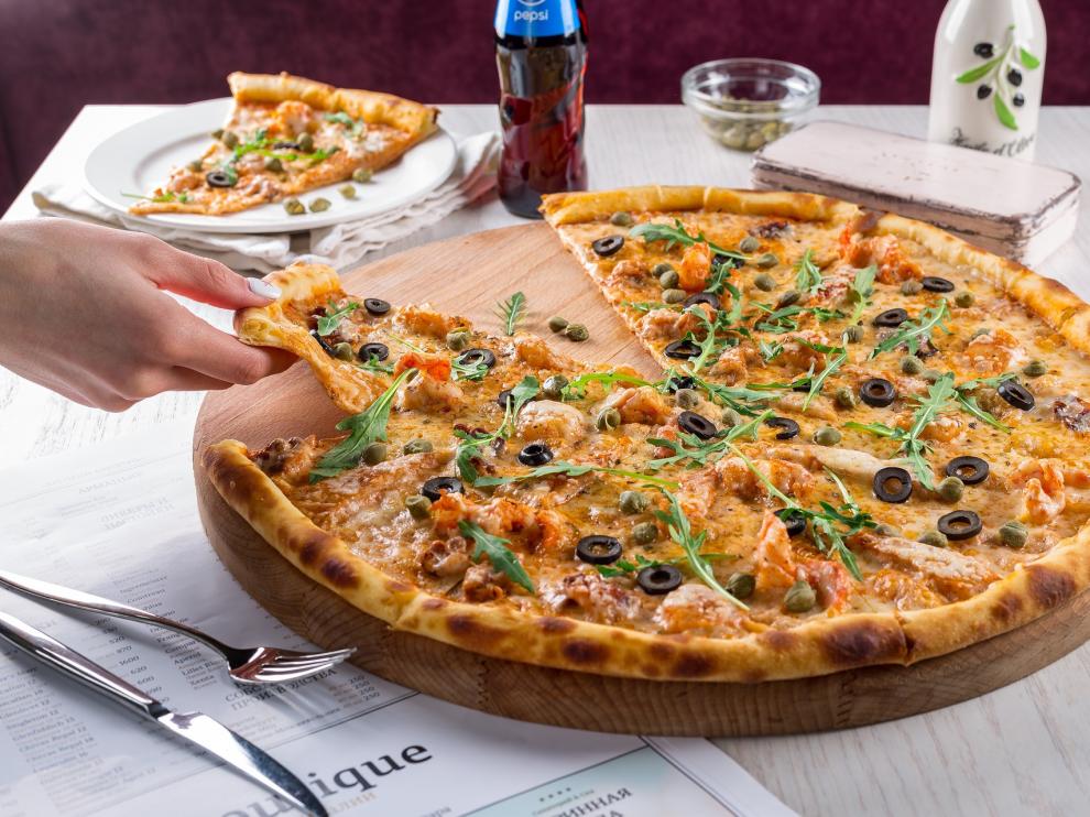 Casi nadie se puede resistir a un buen trozo de pizza.