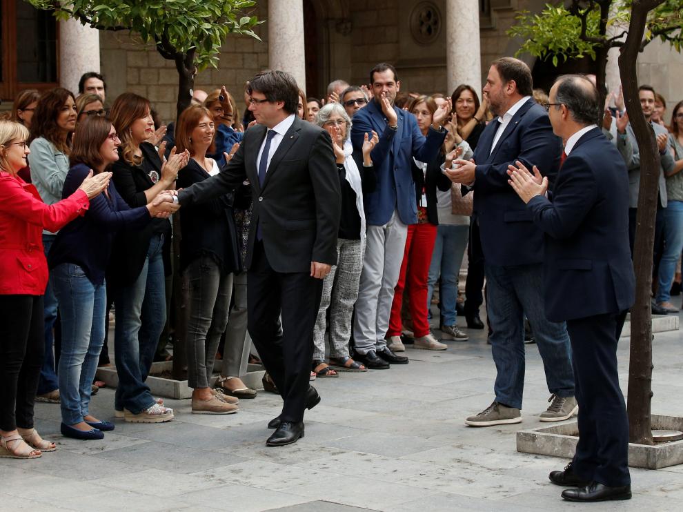 Puigdemont llegando al palacio de la Generalitata este lunes.
