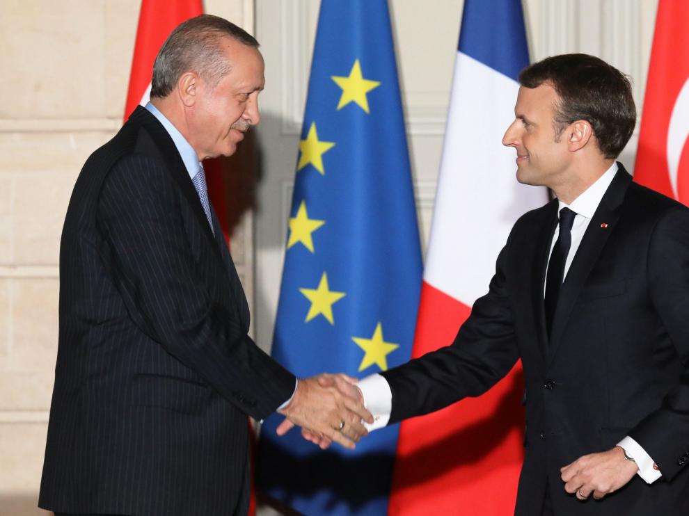 El presidente turco, Erdogan, junto a su homólogo francés, Emmanuel Macron.