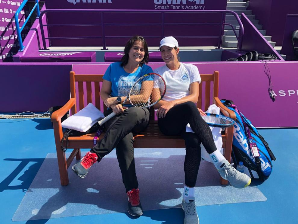 Conchita Martínez junto a Garbiñe Muguruza.