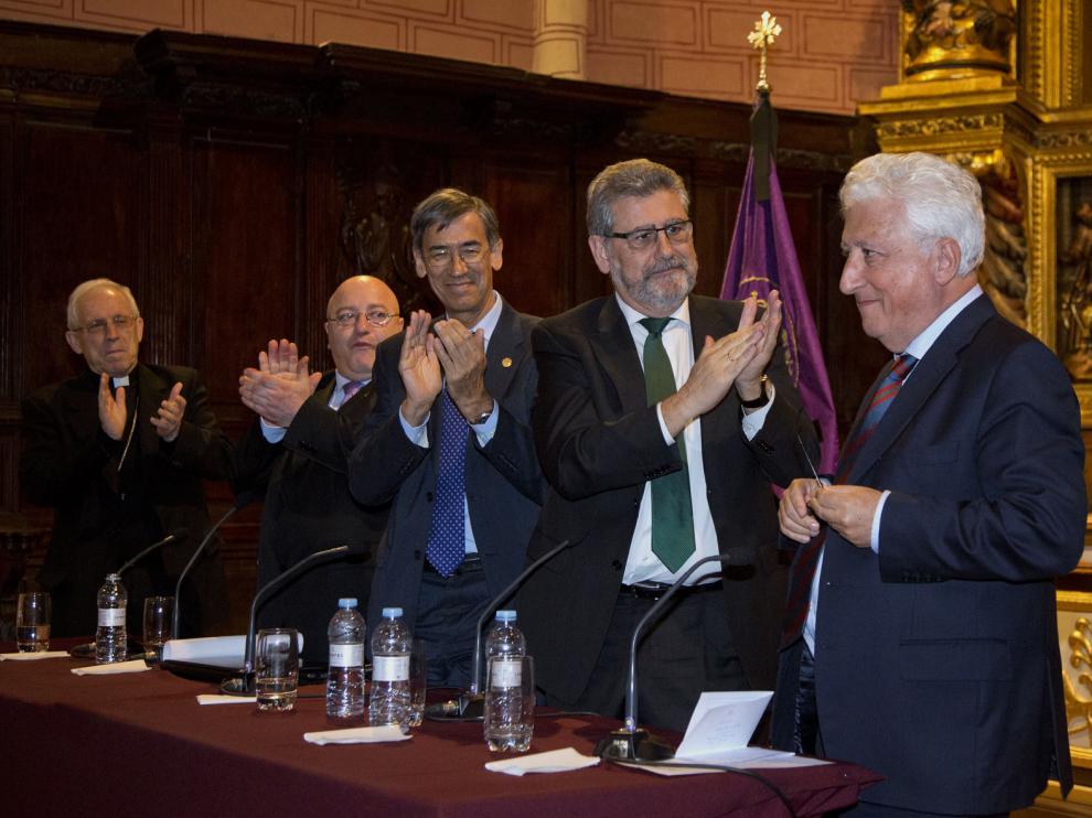 Eusebio Hernández, Jacinto Julve, Jose María Rivera y José A. Mayoral aplauden a García Vicente.