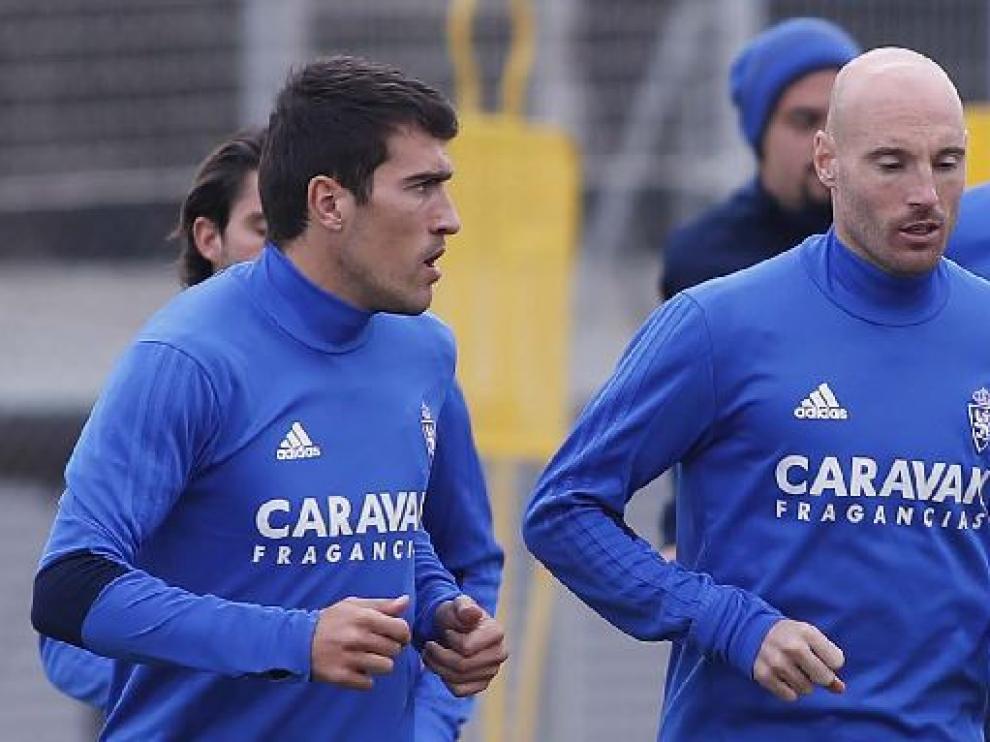 Zapater y Toquero, juntos en un entrenamiento.