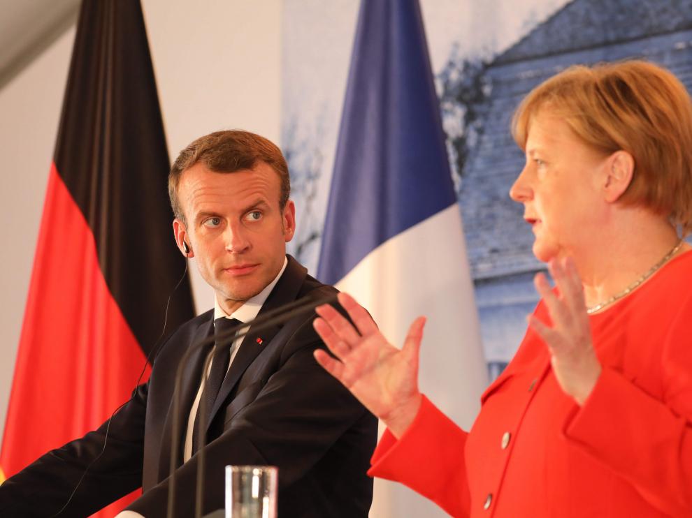 Merkel y Macron acuerdan un presupuesto común para la eurozona y un fondo de rescate como el FMI