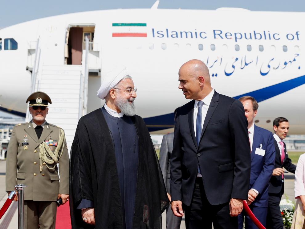 El presidente de Irán, Hasan Rohaní, junto a su homólogo suizo, Alain Berset.