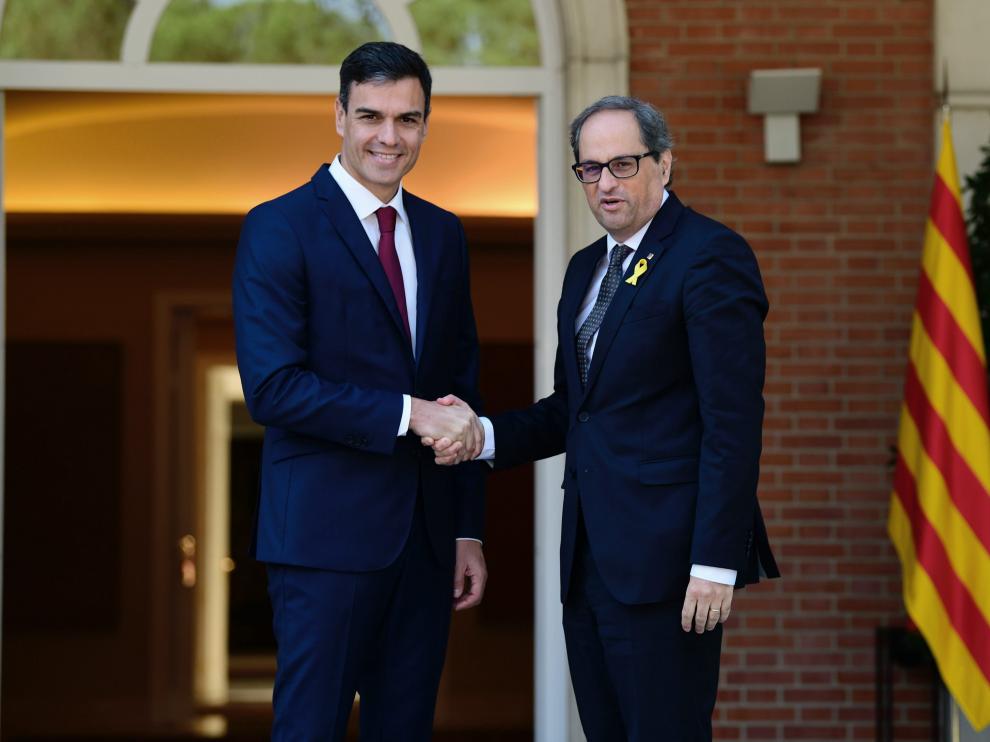 Pedro Sánchez y Quim Torra.