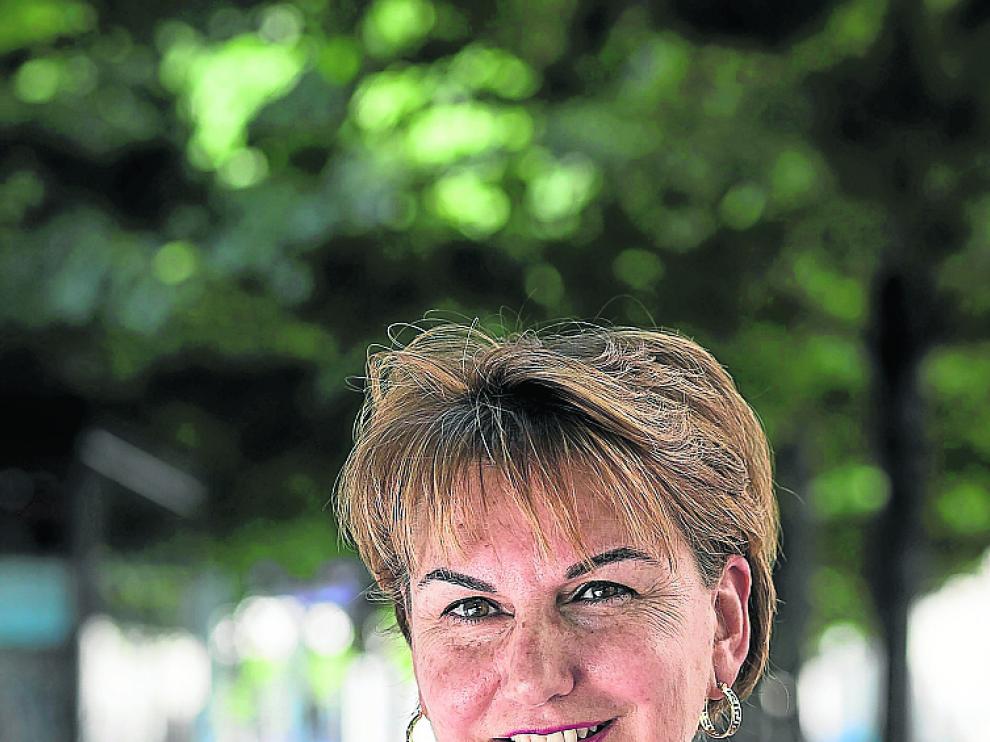 La musicoterapeuta Mónica Romero posa para la cámara.