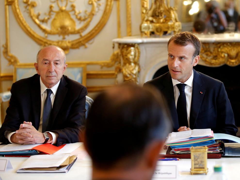 Emmanuel Macron junto al ministro de Interior francés Gérard Collomb.