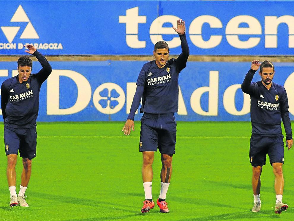 Aguirre, Grippo y Buff, en el entrenamiento celebrado ayer en La Romareda.