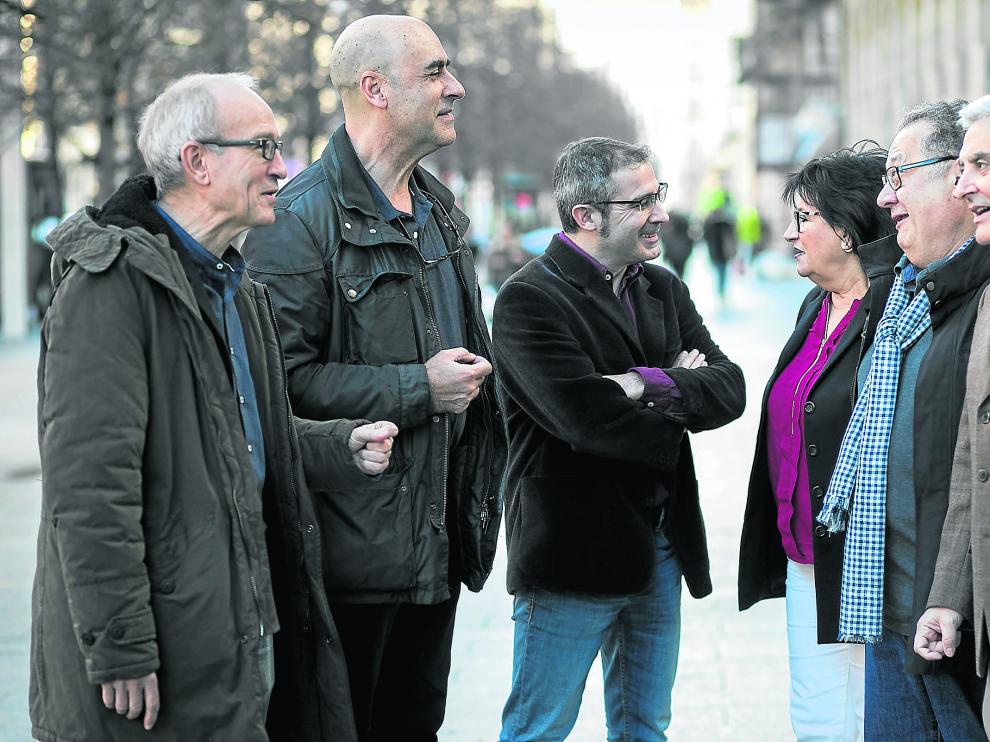 Carmelo Pelegrín, Valero Pérez y Carlos Iglesias, jefes del Servicio de Psiquiatría en San Jorge, Clínico y Obipo Polanco; Ana López, presidenta de Asapme, que acoge a las familias de enfermos; Alfonso Pérez Poza, presidente de la Sociedad Aragonesa y Riojana de Psiquiatría, y su vicepresidente, Carlos Marcos.