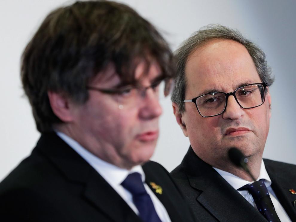 Puigdemont había sido invitado, junto al actual presidente de la Generalitat, Quim Torra, a una ponencia sobre el referéndum.