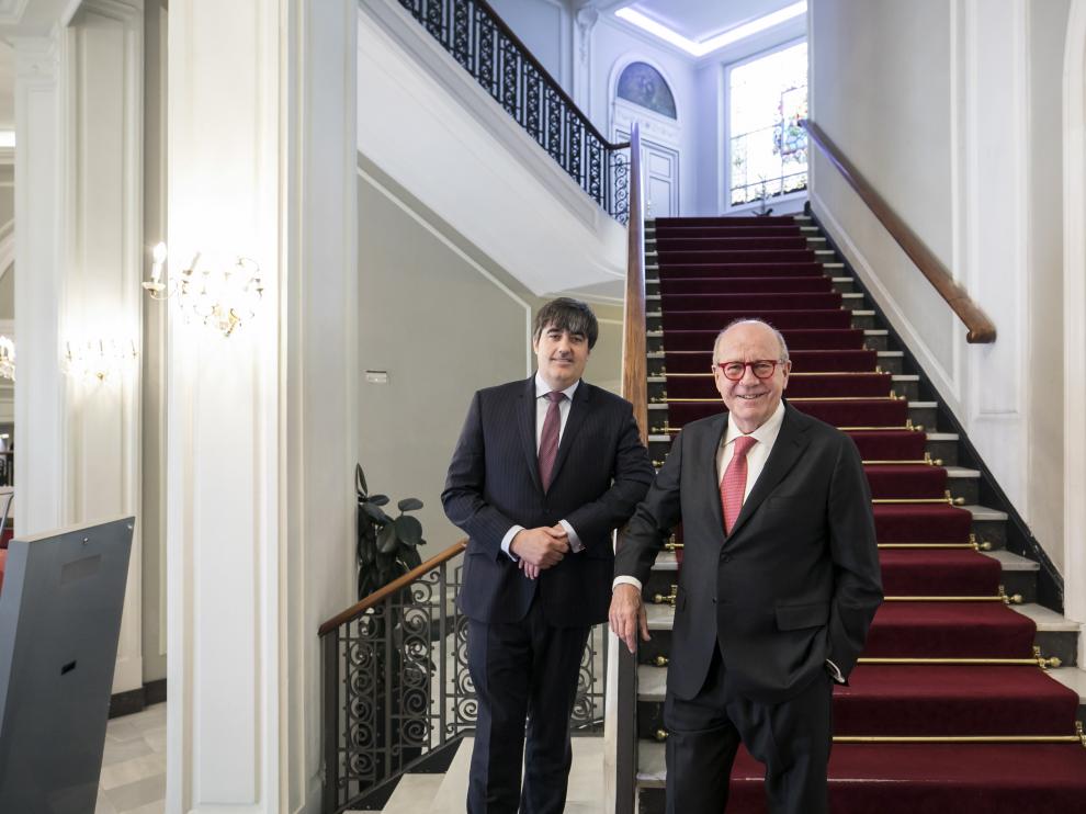 Carlos Aso (Andbank) y Joaquín Herrero (Merchbanc), en Zaragoza.