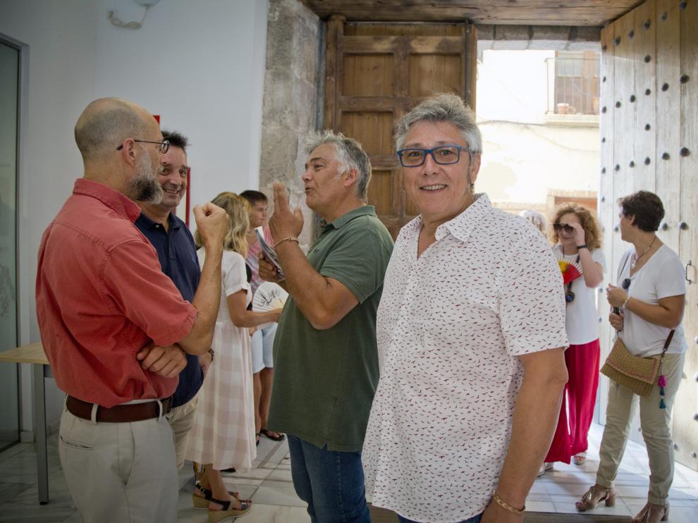 Julián Millán, en primer plano, minutos antes de la celebración de la conferencia