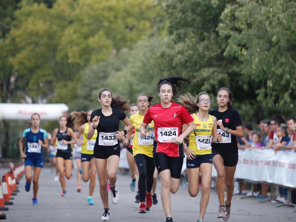 La Carrera de la Infancia de Zaragoza ha celebrado este domingo su decimocuarta edición con la participación de más de 1.100 niños en el Parque José Antonio Labordeta.