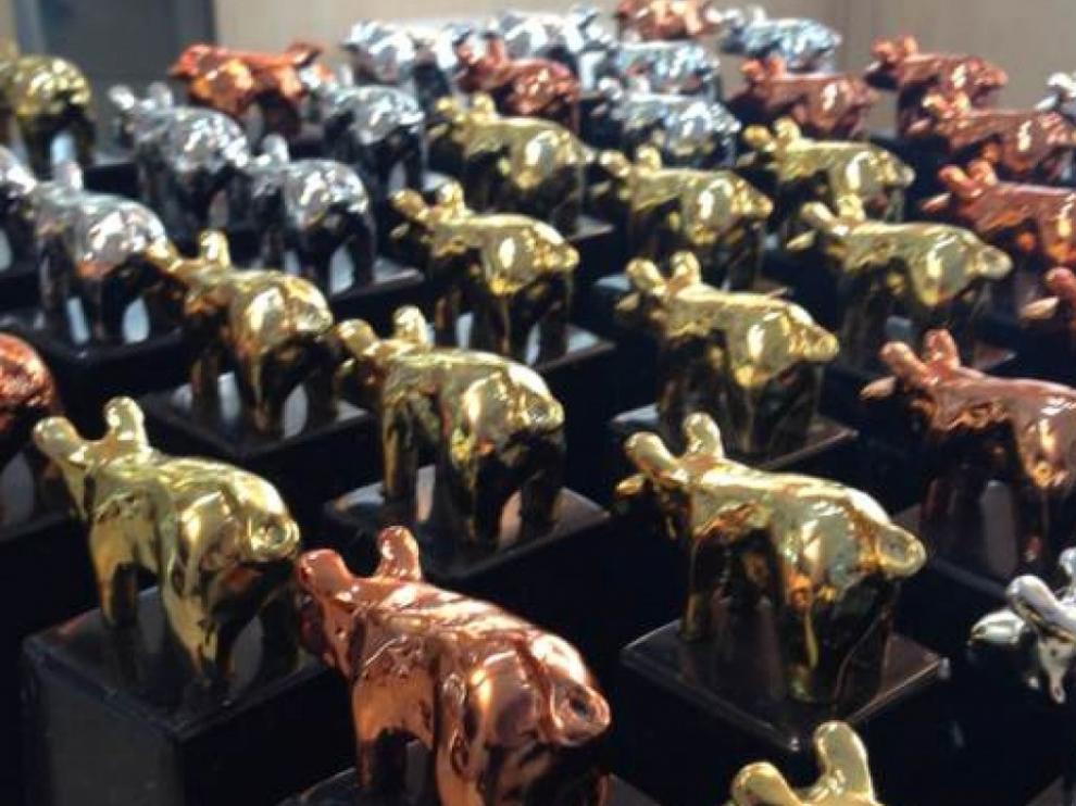 Estatuillas de oro, plata y bronce con las que los Porc d'Or reconocen a los premiados